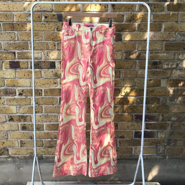 pink and yellow 70s print jeans