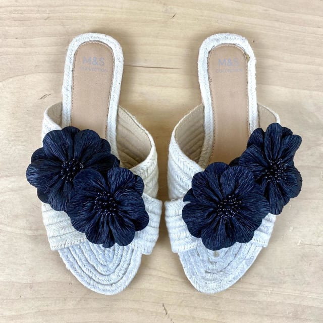 white sandals with blue flowers